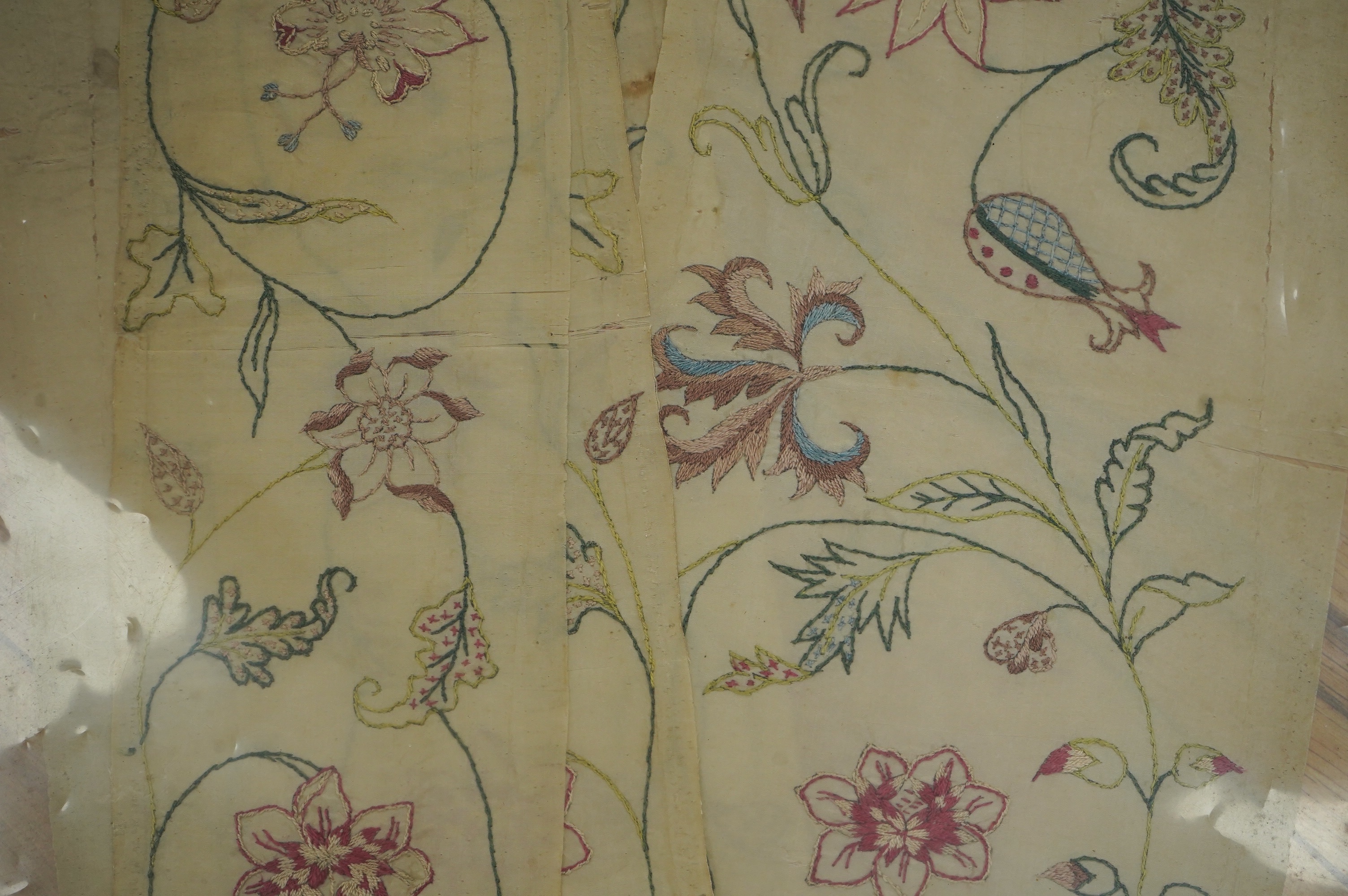 Two pairs of 18th century embroidered silk dress panels, one pair sleeve panels, the other pair possibly bodice panels, all panels hand embroidered in multi-coloured silk threads into a floral vineous design, sleeve pane